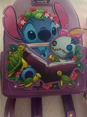 Stitch reading to Scrump with turtles loungefly